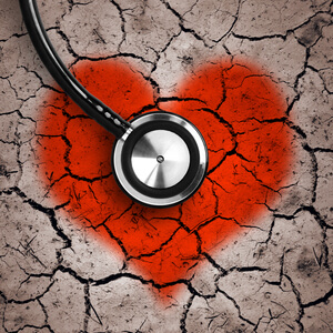 Heart in desert land and stethoscope
