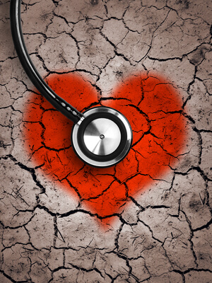 Heart in desert land and stethoscope